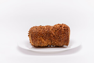 trdelnik on a on a white plate on a white background