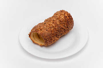 trdelnik on a on a white plate on a white background