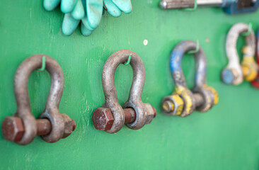 Iron shackles (lifting equipment) which is prepared on wall's storage hook, prepartion for using in...