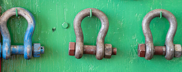 Iron shackles (lifting equipment) which is prepared on wall's storage hook, prepartion for using in...