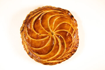 Galette des rois on wooden table, Traditional Epiphany cake in France. High quality photo