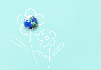 Globe earth in white flower shape shape on yellow background,  World  flower day and Hope for better environmental world concept, Elements of this image furnished by NASA