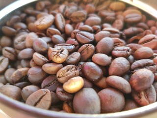 Dark roasted brown coffee beans