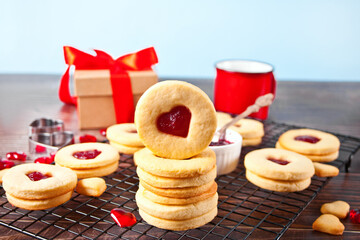 Heart shaped traditional linzer cookies with strawberry jam. Valentine s day concept.