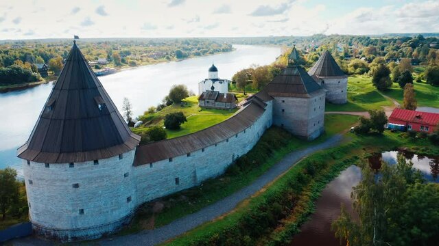 Old Russian fortress. Ancient fortress on the coast of Volkhov river in the town of Staraya Ladoga (Old Ladoga) in Russia. Aerial view of the ancient fortress.