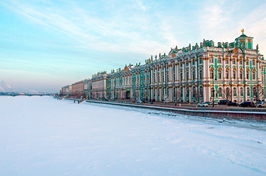 View of frozen Neva river and Hermitage museum - Winter Palace building in St Petersburg, Russia
