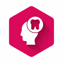 White Human head with tooth icon isolated with long shadow. Tooth symbol for dentistry clinic or dentist medical center and toothpaste package. Pink hexagon button. Vector