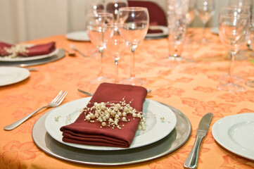 Luxurious table set for a celebration, wedding or event with glassware and cutlery