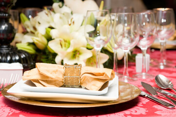 Luxurious table set for a celebration, wedding or event with glassware and cutlery