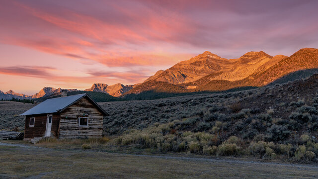 Sunrise over the Lost River Range in Idaho with cabin