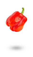 Levitation of red pepper isolated on white background.