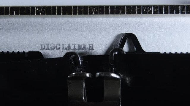 Typing DISCLAIMER with an old manual typewriter