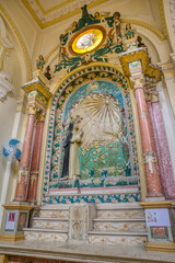 Guayaquil, Guayas, Ecuador - November, 2013: Interior of the Santo Domingo church (Saint Domingo), with its many decorations, statues, religious art, paintings, columns and stained glass windows