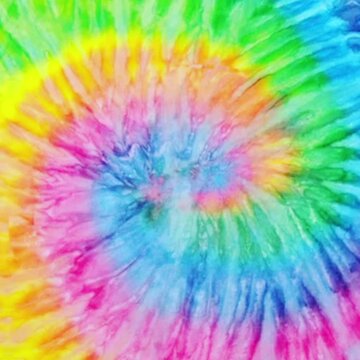 tie dye vivid colourful rainbow background swirl with copy space, tie dye popular with hippy in 70s 