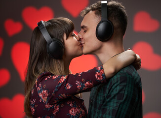 Couple kissing while listening music