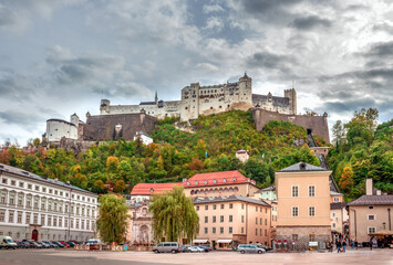 Scenic view of the Hohensalzburg fortress, Salzburg, Austria. The Kapitelplatz square with famous Hochensalzburg castle view.