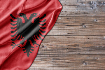Wooden pattern old nature table board with Albania flag