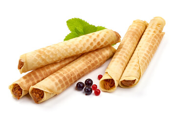 Wafer rolls with condensed milk, homemade sweets, isolated on white background.