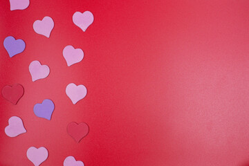 hearts on a red background. Abstract Sainte Valentine background, mothers day, birthday greeting cards, invitation, celebration concept