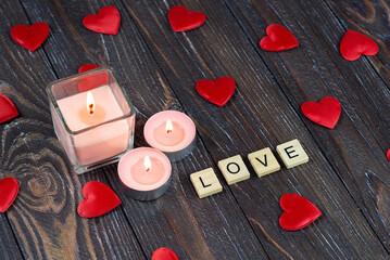 Love letters on the table. Heart, love, candle with flame. Postcard, wallpaper, banner, background. Valentine's Day.