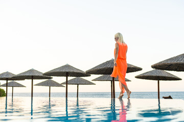 Young woman in the swimming pool