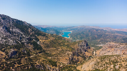Fototapeta na wymiar Landscape of high hills in Crete on the background of the sky
