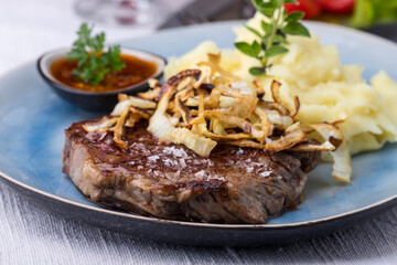 steak with roasted onions
