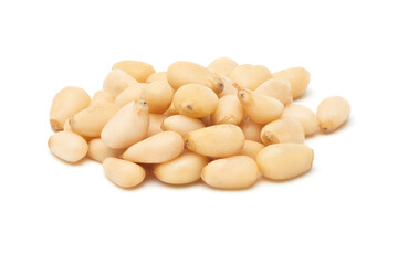 Siberian Peeled pine nuts isolated on white background. Healthy nuts snacks. Clipping path, full...