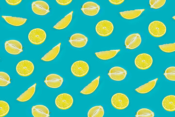 Fruit seamless pattern of lemon slices on a vivid blue background. Tropical organic fruit, citrus, vitamin C. Lemon slices.