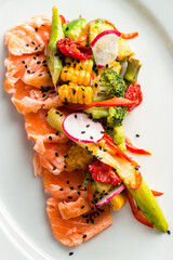 Steam salmon and vegetables, Paleo, keto, fodmap, dash diet. Mediterranean diet with fish. Healthy concept, gluten free, lectine free