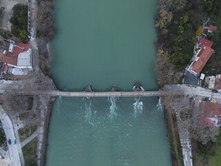 Aerial View Of Arta City Old Stone Brige Of Arachthos River In Epirus, Greece