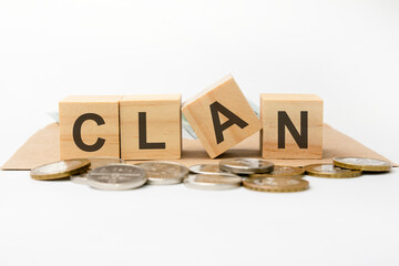 clan word written on wooden blocks. business concept