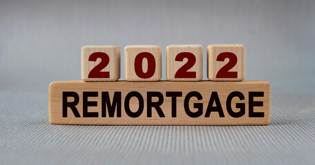 REMORTGAGE 2022 - words on wooden cubes on a gray background
