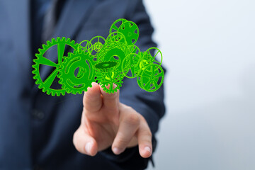 Mechanism green gears and cogs at work on black background. Industrial machinery. 3D illustration. 3D high quality rendering.