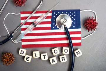 DELTACRON. New strain of coronavirus Covid19. Syringe, United States of America mask and flag.