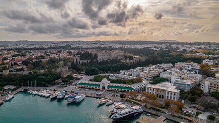 Fototapeta premium Aerial drone view of Rhodes town center during sunset