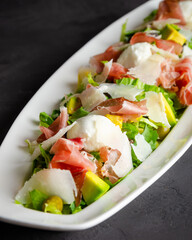 Buffalo cheese and serrano ham salad