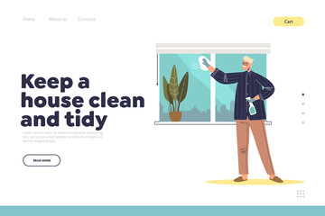 Man washing windows at home. Young male cleaning house busy with housekeeping chores