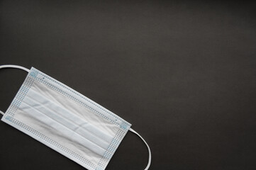 Medical mask isolated on background. Close-up of Coronavirus or COVID-19 protective face mask....