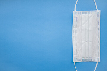 Medical mask isolated on background. Close-up of Coronavirus or COVID-19 protective face mask....