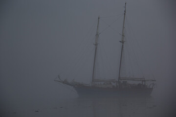 Ship on a foggy morning, ghost ship in fog
