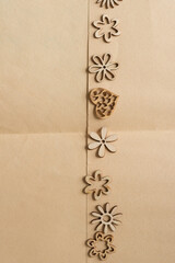 fancy wooden hearts with floral shapes on old paper