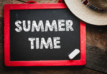 SUMMER TIME words on a chalkboard. Time for rest and summer vacations. © roobcio