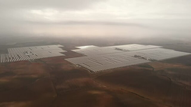 Aerial drone point of view photo Gemasolar Concentrated solar power plant CSP, system generate solar power using mirrors lenses to concentrate large area of sunlight onto receiver, Seville Spain	