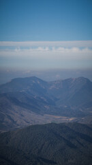 Fototapeta premium Peña Oroel stands guard over one of the main towns of the Huesca province, Jaca in the Aragonese Pre Pyrenees.