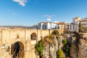 Photo sur Plexiglas Ronda Pont Neuf The Puente Nuevo, the old stone bridge spanning the El Tajo gorge in the mountaintop city of Ronda, the in Malaga province of Southern Spain.