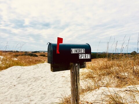 Bird Island, North Carolina, US - December 28, 2019: Kindred Spirit Mailbox, a unique landmark on Sunset beach. It serves as Symbol of Hope, and collects secrets from visitors who open up their hearts