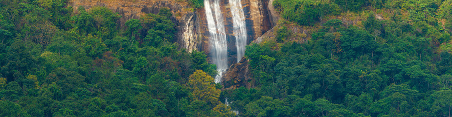 Panoramic beautiful deep forest waterfall in Chiang Mai at Thailand.