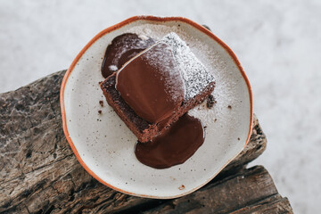 Delicious chocolate cakes with chocolate sauce. Sweet food. Sweet dessert. Close up.