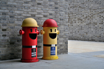 Creative cartoon emoticons sorting rubbish bins on Chinese city streets
